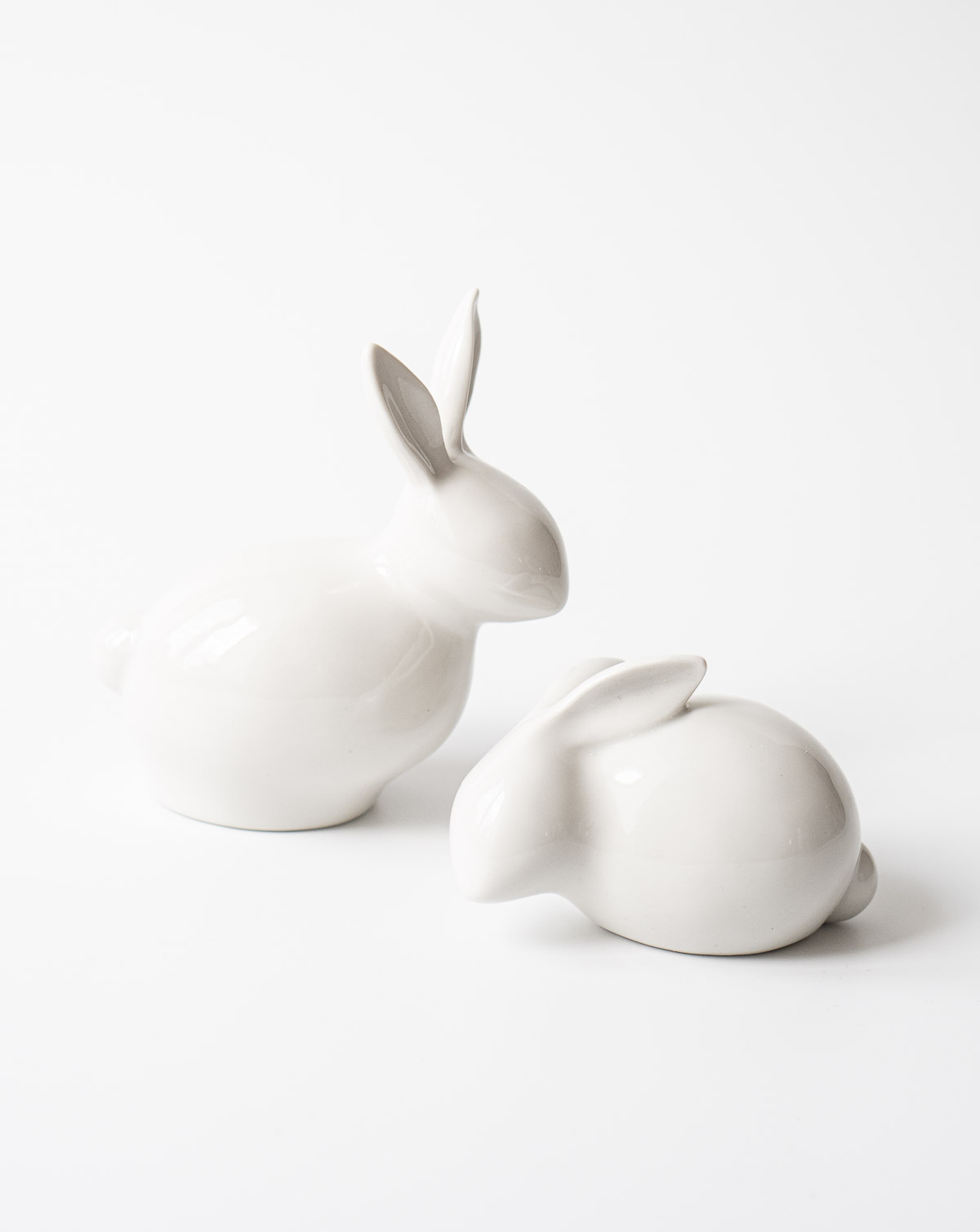 Білі порцелянові кролики, декоративні фігурки кроликів в інтер'єр